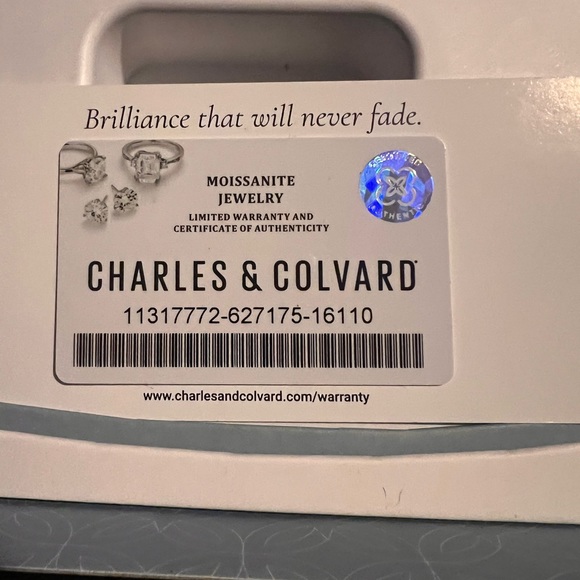 COPY - Charles & Colvard Emerald Forever One Moissanite
Engagement Ring - Picture 3 of 9